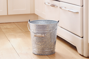 Galvanized Waste Bin Trash Can with Wooden Handle in Kitchen