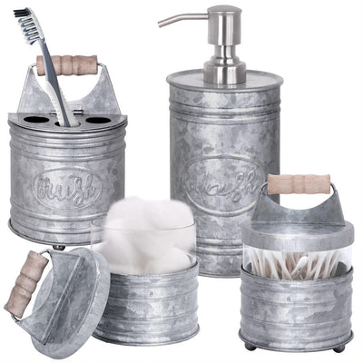 Autumn Alley 4 Piece Galvanized Bathroom Set with Soap Dispenser, Toothbrush Holder & 2 Apothecary Jars. Wooden Handles and Embossed Labels read 'Wash' and 'Brush' in stylized cursive