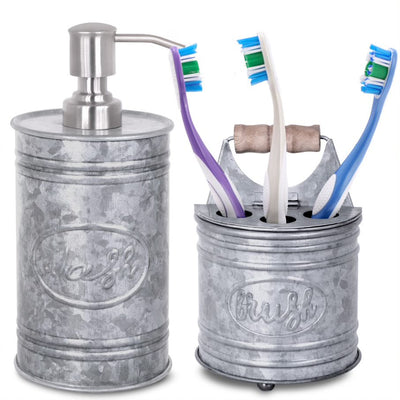 Autumn Alley 2 Piece Galvanized Bathroom Set with Soap Dispenser and Toothbrush Holder. Embossed Labels read 'Wash' and 'Brush' in stylized cursive